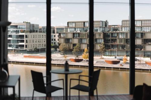 a view of a city from the window of a building at Stunning 1-Bed Above Foreshore with Water Views in Kingston