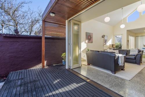 a living room with a couch and a living room at Gorgeous 2-Bed Victorian Home in Artsy Suburb in Melbourne