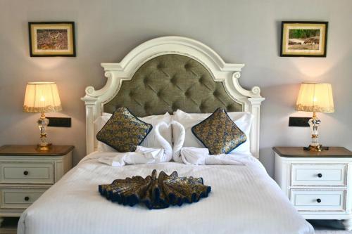 Ένα ή περισσότερα κρεβάτια σε δωμάτιο στο Tuli Orchid