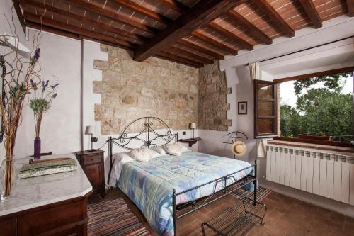A bed or beds in a room at Agriturismo La Provenca
