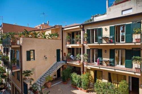 an image of an apartment building with balconies at Residence Degli Agrumi in Taormina
