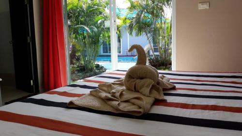 Postel nebo postele na pokoji v ubytování Carpe Diem Guest House