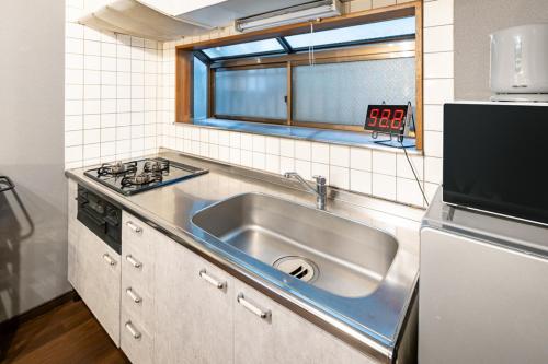 Η κουζίνα ή μικρή κουζίνα στο 中板橋