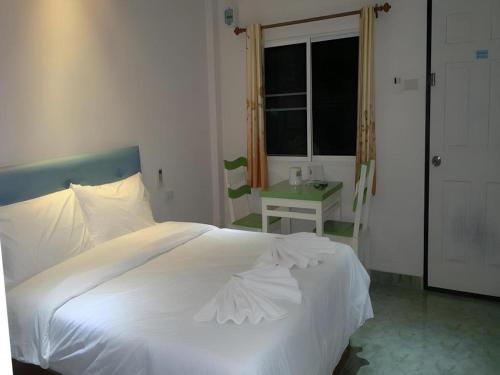 Voodi või voodid majutusasutuse Wattana Hill Resort toas