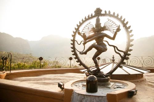 a statue of a man holding a spear at Hostal de la Luz - Spa Holistic Resort in Tepoztlán