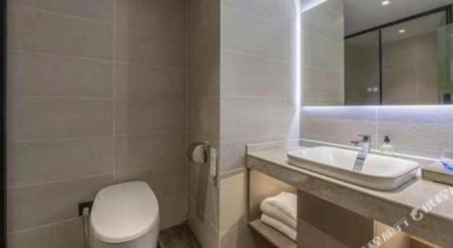 Koupelna v ubytování GreenTree Inn Nantong Haian Kaifa District Express Hotel