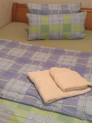Katil atau katil-katil dalam bilik di The Place After the Race B&B