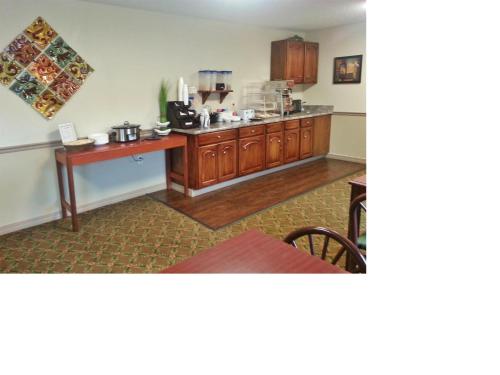a kitchen with a counter in a room at Americas Best Value Inn & Suites - Little Rock - Maumelle in Maumelle