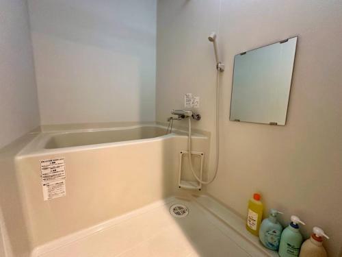 Ένα μπάνιο στο 411札幌駅7分と大通駅徒歩6分で好立地な都心を満喫でき綺麗な部屋で快適が生活が実現