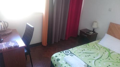 Katil atau katil-katil dalam bilik di The Quiet Corner Guest House