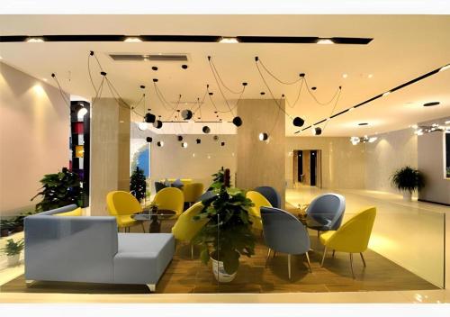 Φωτογραφία από το άλμπουμ του Echarm Hotel Beihai Railway Station σε Dianbailiao