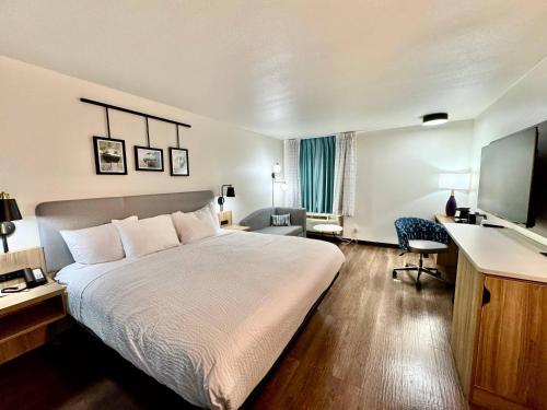 Ένα ή περισσότερα κρεβάτια σε δωμάτιο στο Sleep Inn & Suites Searcy near University