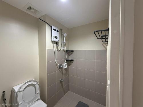 Un baño de CDO City Center Avida Condo Fast Wifi