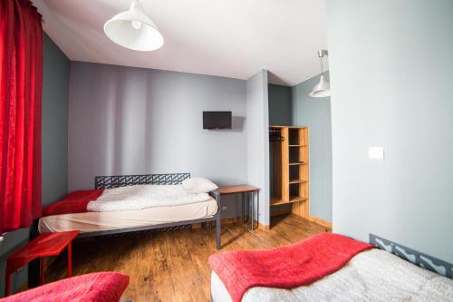 Katil atau katil-katil dalam bilik di Hostel Fabryka