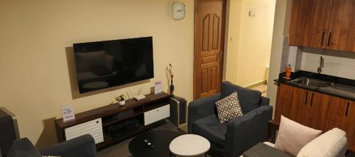 Posezení v ubytování Ebony 1br Nanyuki town