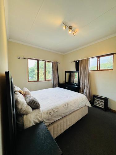 Ένα ή περισσότερα κρεβάτια σε δωμάτιο στο Gem in the heart of Sandton