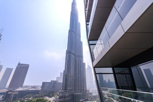 Free housekeeping visits during your stay - StayShort - Exceptional 2BR with Burj Khalifa Views in Downtown