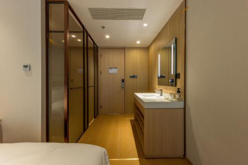 Ένα μπάνιο στο Hangzhou Wulinmen Bernard Hotel Gongshu District Branch