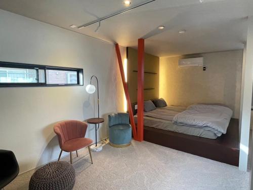 Postel nebo postele na pokoji v ubytování Doa Doa