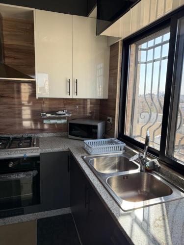 Kuchyň nebo kuchyňský kout v ubytování Sport city