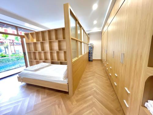 Postel nebo postele na pokoji v ubytování Vinh Loc Garden Villa