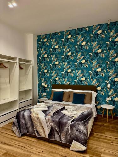 Giường trong phòng chung tại guest house Napul'è