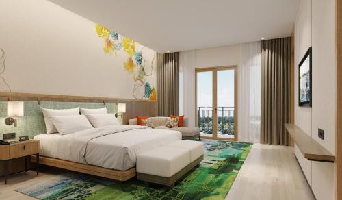 Postel nebo postele na pokoji v ubytování Holiday Inn Lampung Bukit Randu by IHG