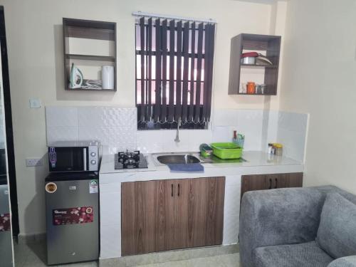 Η κουζίνα ή μικρή κουζίνα στο Tabz BnB