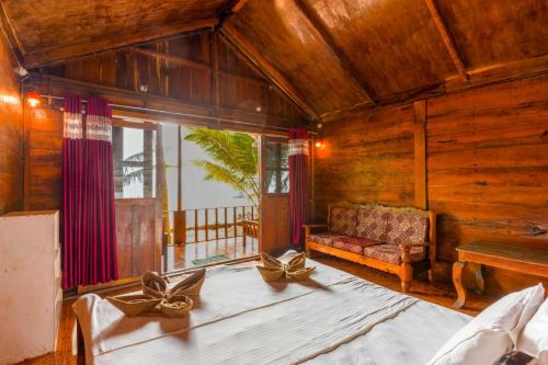 Voodi või voodid majutusasutuse Blue Lagoon Resort Goa toas