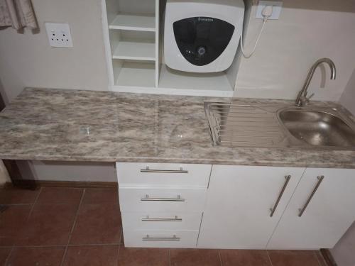 Η κουζίνα ή μικρή κουζίνα στο MDA Myburgh