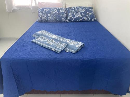 Ένα ή περισσότερα κρεβάτια σε δωμάτιο στο Casa aconchegante