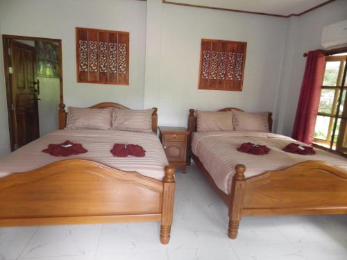 Ліжко або ліжка в номері Jasmin Resort