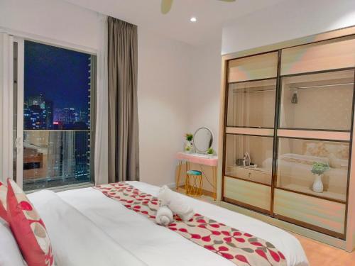 Ένα ή περισσότερα κρεβάτια σε δωμάτιο στο Happy Stay At Quill Residence KLCC