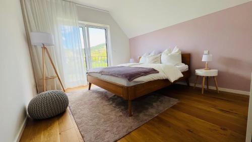 Postel nebo postele na pokoji v ubytování Haus im Weinberg