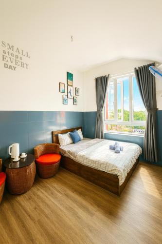 Postel nebo postele na pokoji v ubytování Cao Nguyên Đỏ Homestay - BBQ - Coffee