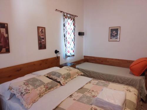 Ένα ή περισσότερα κρεβάτια σε δωμάτιο στο La Nueva