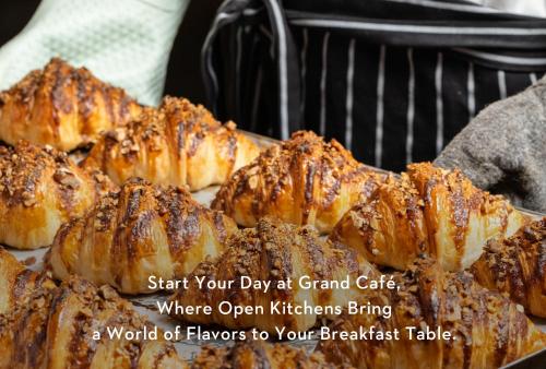a bunch of croissants are cooking on a grill at Grand Hyatt Chengdu in Chengdu