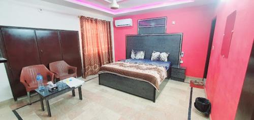 Postel nebo postele na pokoji v ubytování Hotel New View Guest House