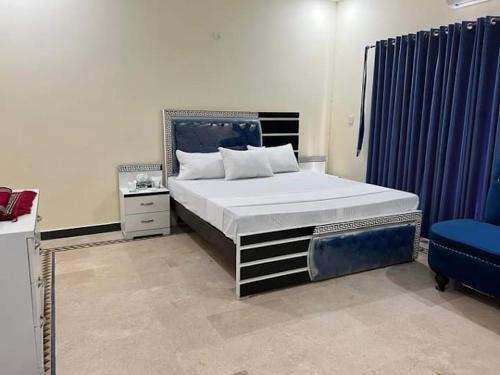 Postel nebo postele na pokoji v ubytování Hotel New View Guest House