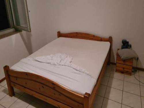 Ένα ή περισσότερα κρεβάτια σε δωμάτιο στο Grotto osteria di Baloi