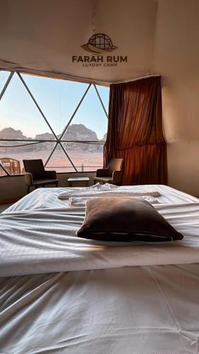 Ένα ή περισσότερα κρεβάτια σε δωμάτιο στο FARAH RUM lUXURY CAMP
