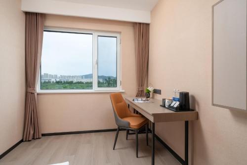 Φωτογραφία από το άλμπουμ του Ward Smart Hotel Jinan Yaogu Weizhen Business Port Branch 