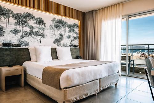 Ένα ή περισσότερα κρεβάτια σε δωμάτιο στο Hotel Costa Salina