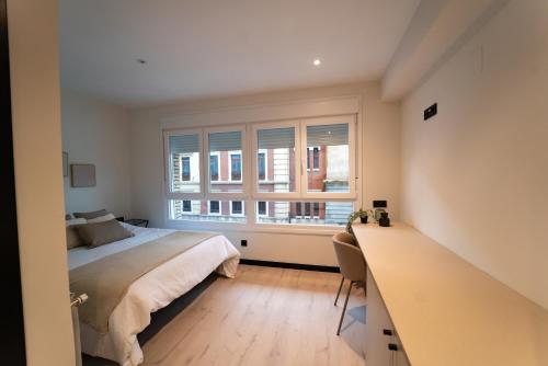 En eller flere senge i et værelse på Rental Room PZ4