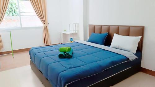 Ένα ή περισσότερα κρεβάτια σε δωμάτιο στο Pai Baan Family