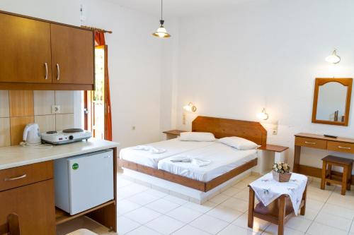 Postel nebo postele na pokoji v ubytování Ideal Hotel