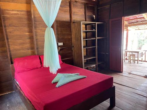 Postel nebo postele na pokoji v ubytování Naks Shack