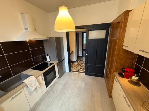 Η κουζίνα ή μικρή κουζίνα στο L'Élégance – Cosy & Chill