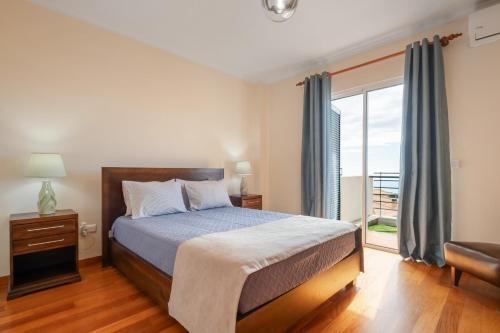 Postel nebo postele na pokoji v ubytování Freitas House by Homie