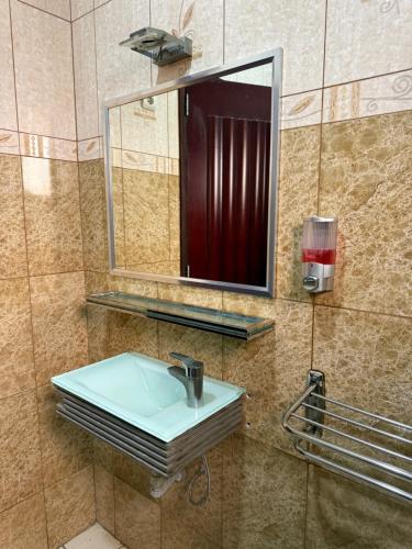 Ένα μπάνιο στο TR GUEST HOUSE SERVIÇOs